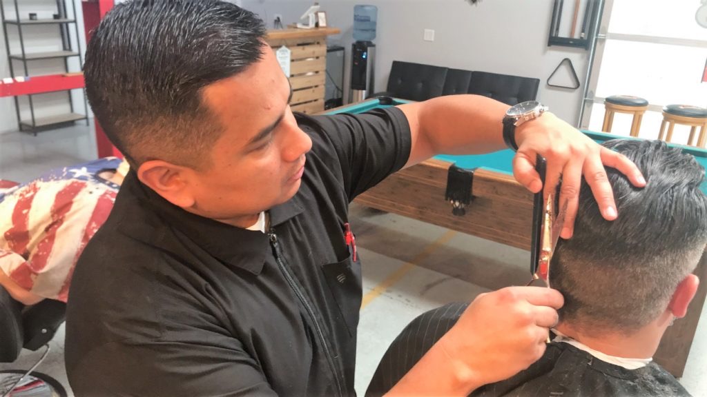 Joe Ybarrar Jr., professional barber at Capitol City Barbers in Salem, Oregon